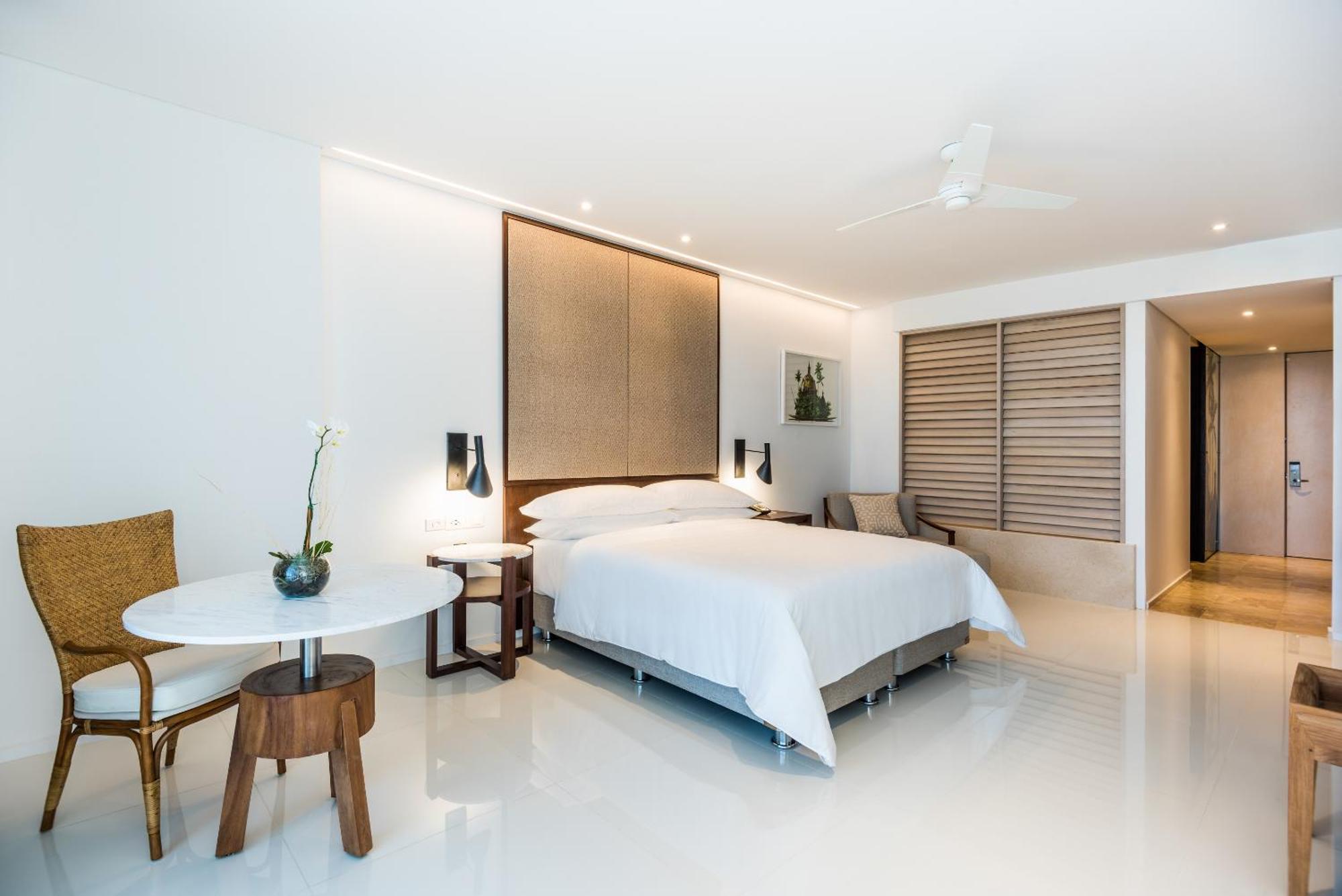 Suite Preferred Club de 1 dormitorio con cama extragrande y vista al mar