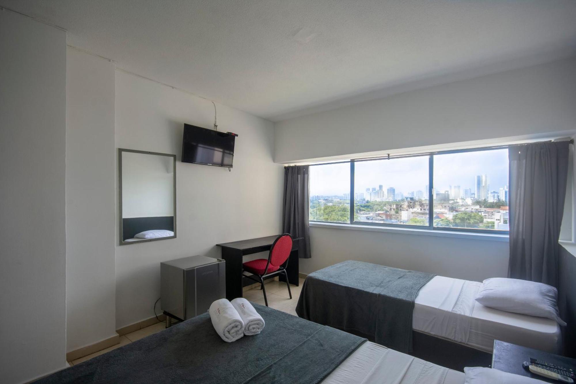 Quarto Duplo